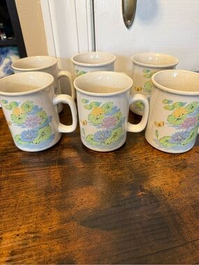 vintage ceramic stoneware mug with a colorful wraparound water lily pond design